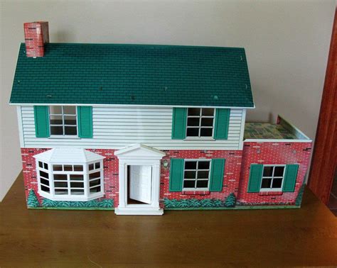 how much is a metal doll house worth|doll house value scale.